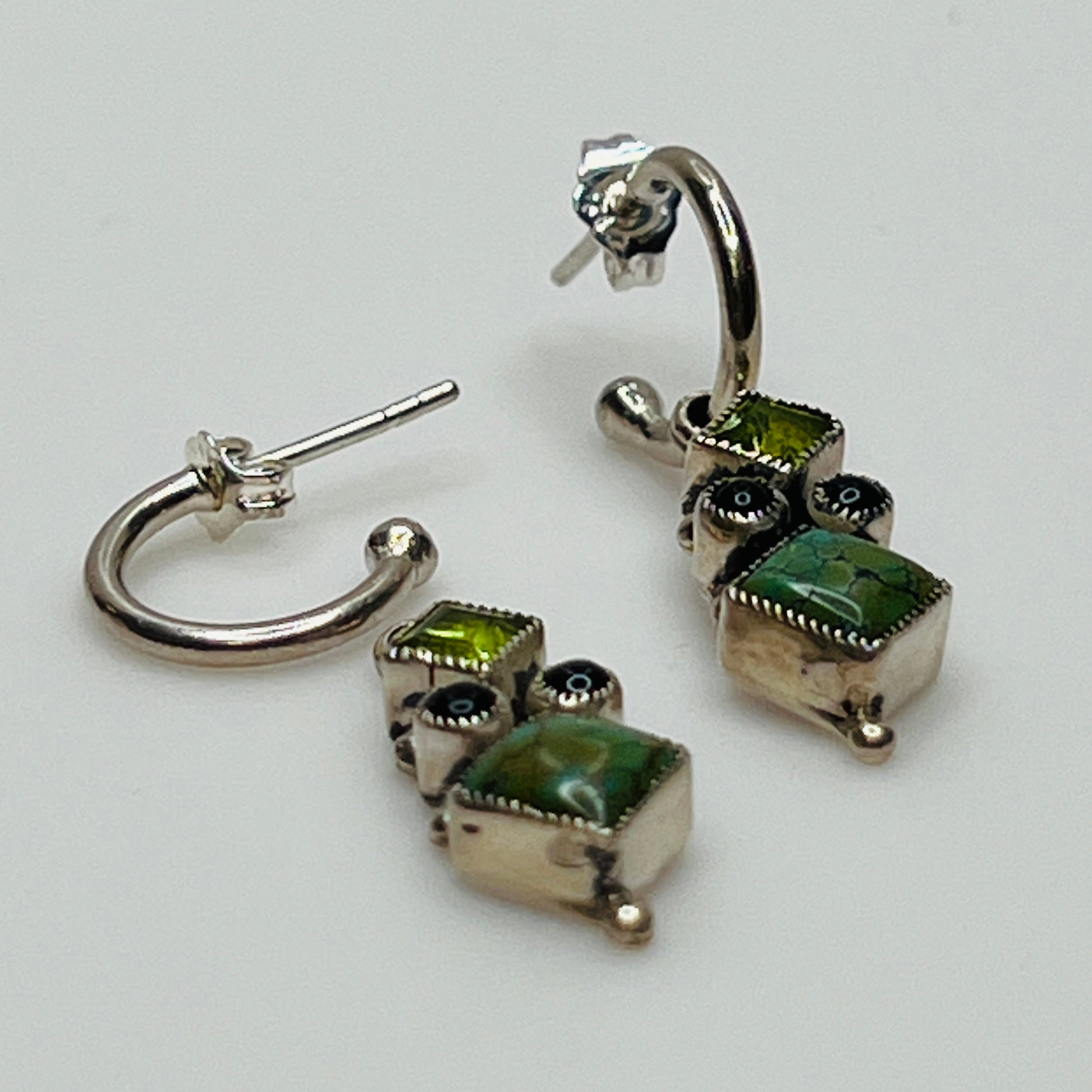 Sterling silver Leo Feeney earrings with peridot, turquoise, and black onyx dangle