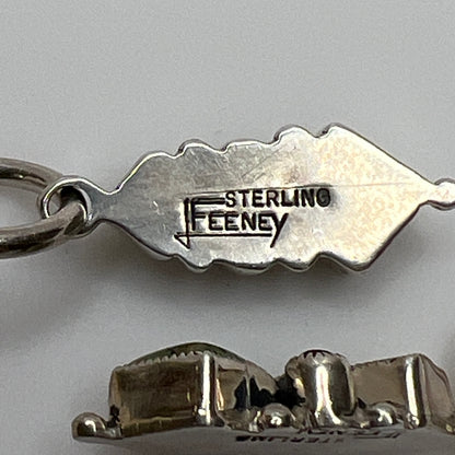 Sterling silver Leo Feeney earrings with peridot, turquoise, and black onyx dangle