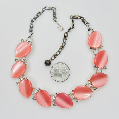 Vintage Lisner thermoset pink leaf necklace with quarter for size