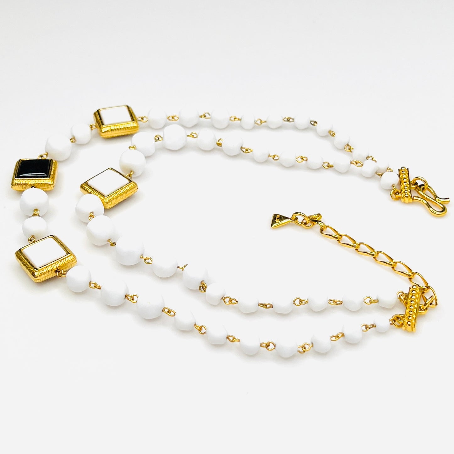 Side view Signed Liz Claiborne necklace and clip earring set with extender