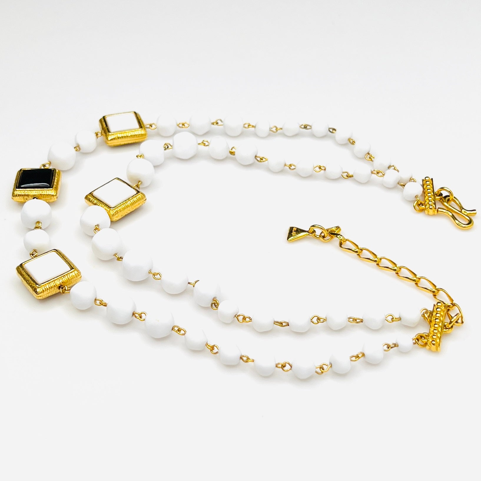 Side view Signed Liz Claiborne necklace and clip earring set with extender