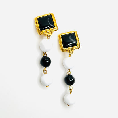 Vintage black white clip earrings with gold tone accents