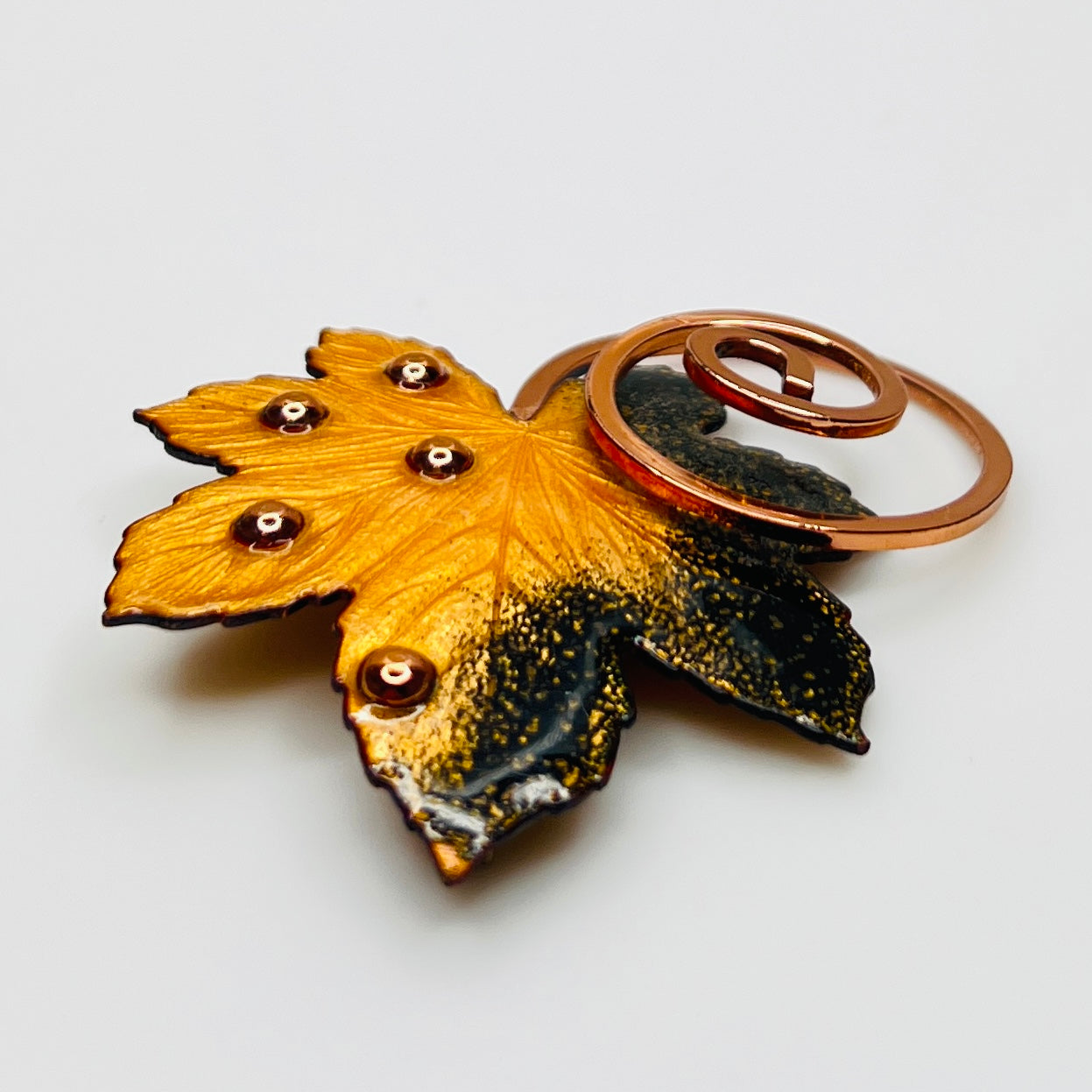 Matisse copper enamel maple leaf brooch and clip-on earring set in gold and black, signed mid-century vintage
