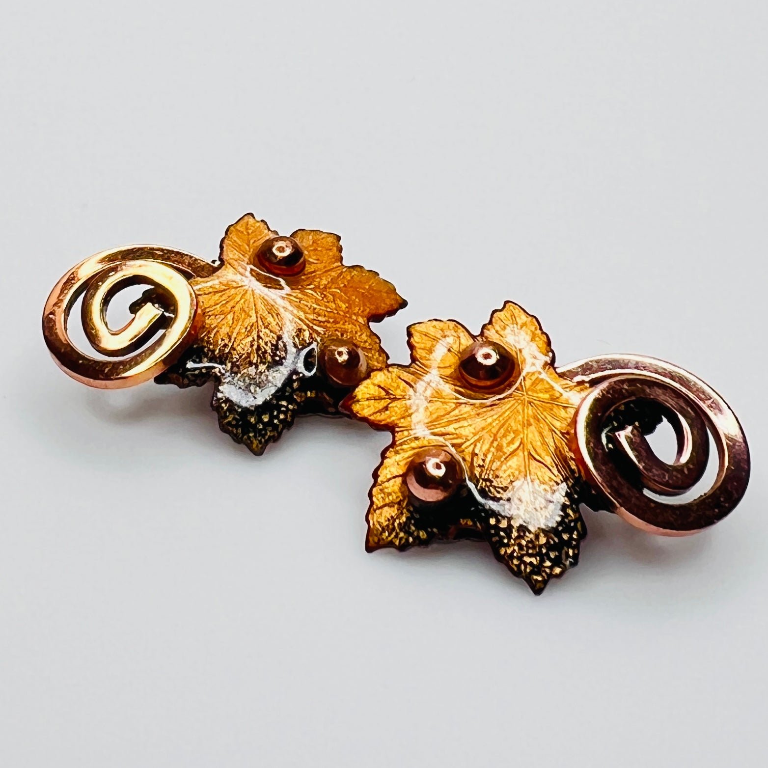 Matisse copper enamel maple leaf brooch and clip-on earring set in gold and black, signed mid-century vintage