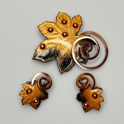 Matisse copper enamel maple leaf brooch and clip-on earring set in gold and black, signed mid-century vintage