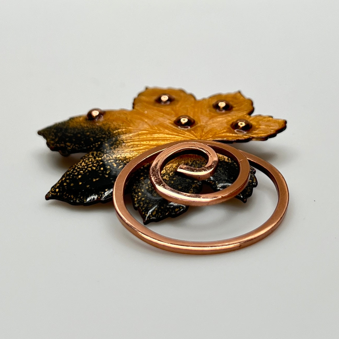 Matisse copper enamel maple leaf brooch and clip-on earring set in gold and black, signed mid-century vintage