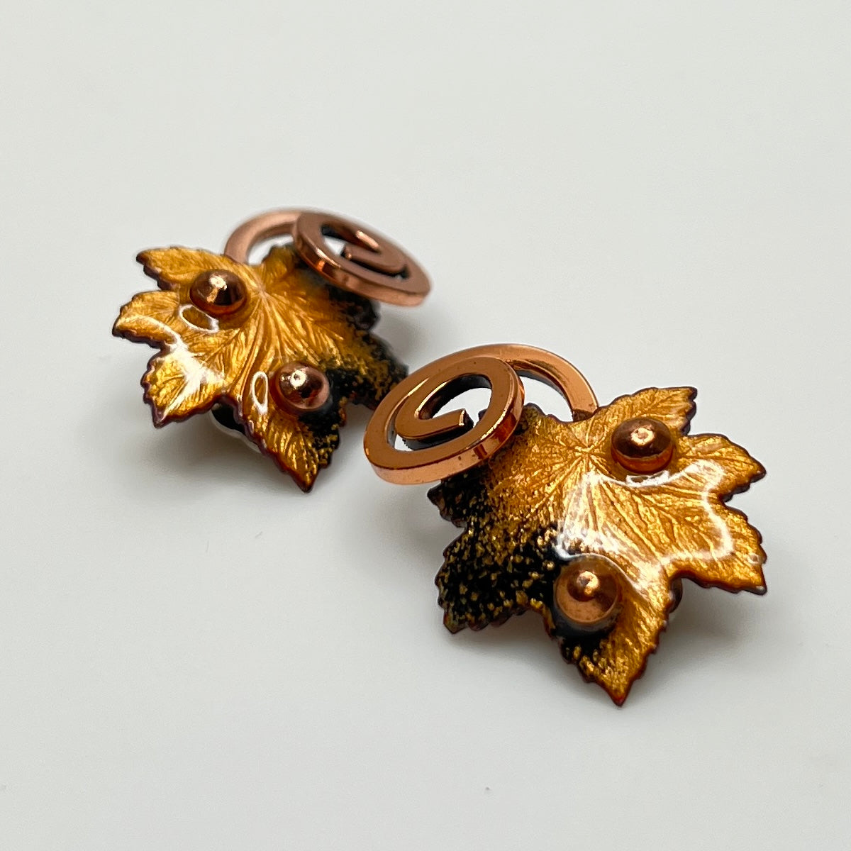 Matisse copper enamel maple leaf brooch and clip-on earring set in gold and black, signed mid-century vintage