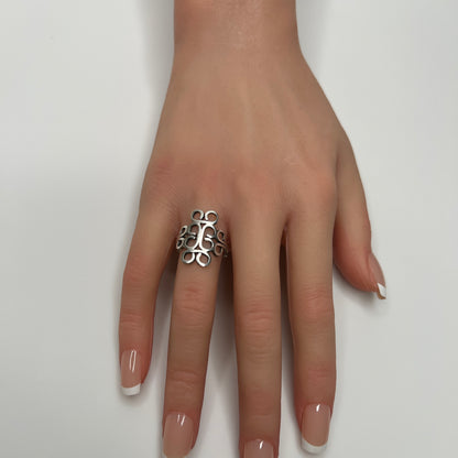 Vintage sterling silver Mexican swirl ring with openwork Aztec design