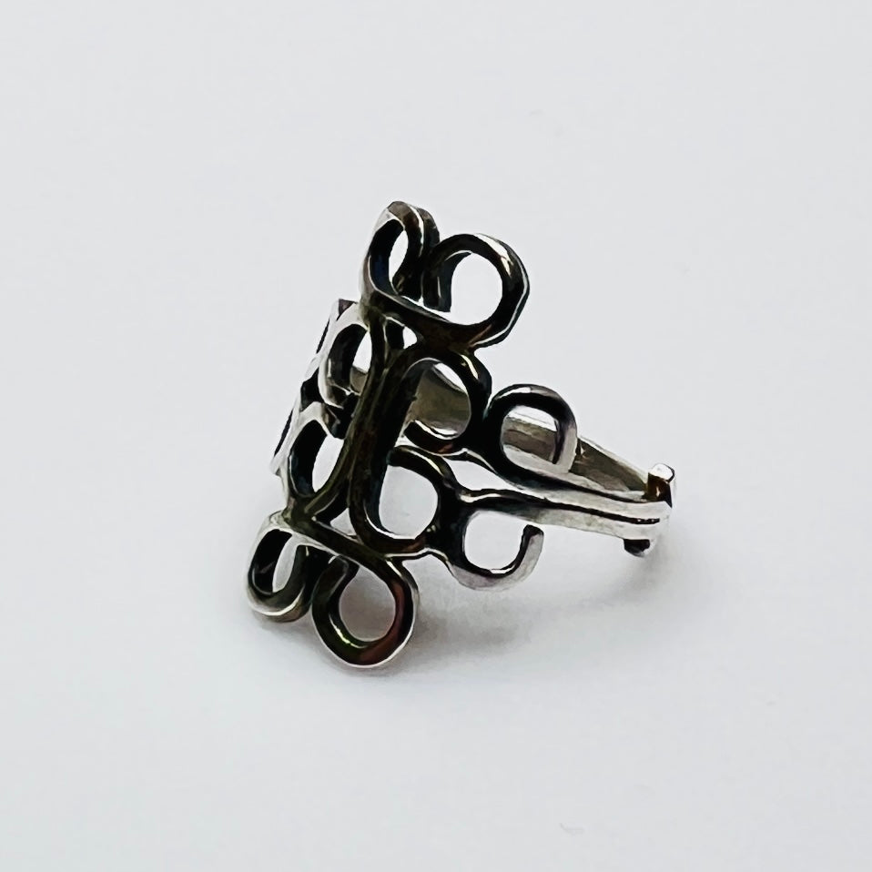 Modernist vintage ring with bold swirl motif in sterling silver