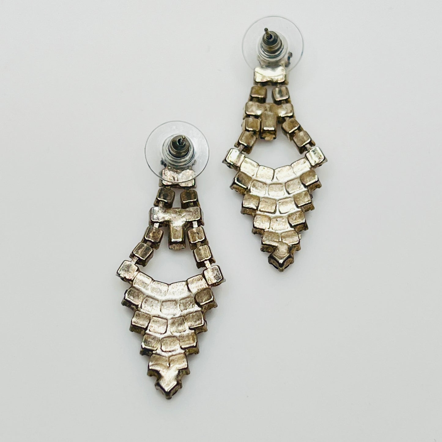 Art Deco-style earrings with black and clear rhinestones in a long silver-tone design