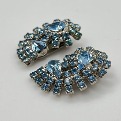 Side view of mid-century blue rhinestone clip-on earrings