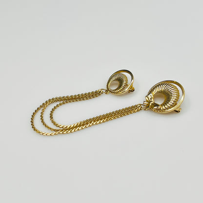 Mid-century gold chatelaine brooch with double wreaths, bow detail, and triple chain drape