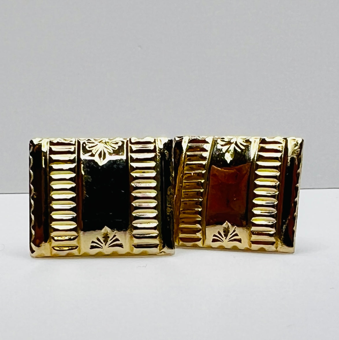 Vintage gold-tone Art Deco cufflinks with geometric striped design