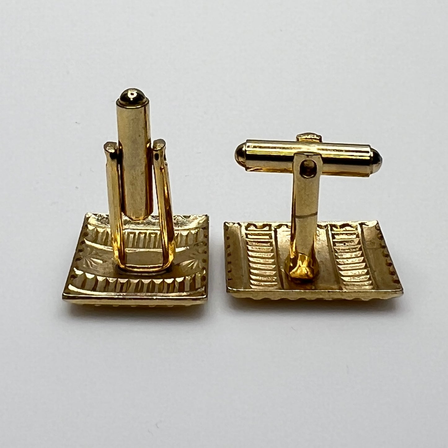 Vintage gold-tone Art Deco cufflinks with geometric striped design