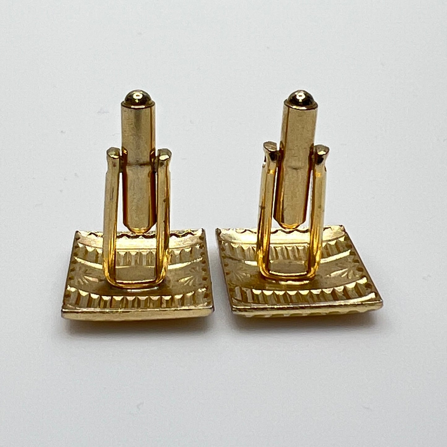 Rectangular Deco cufflinks with engraved detail and polished finish