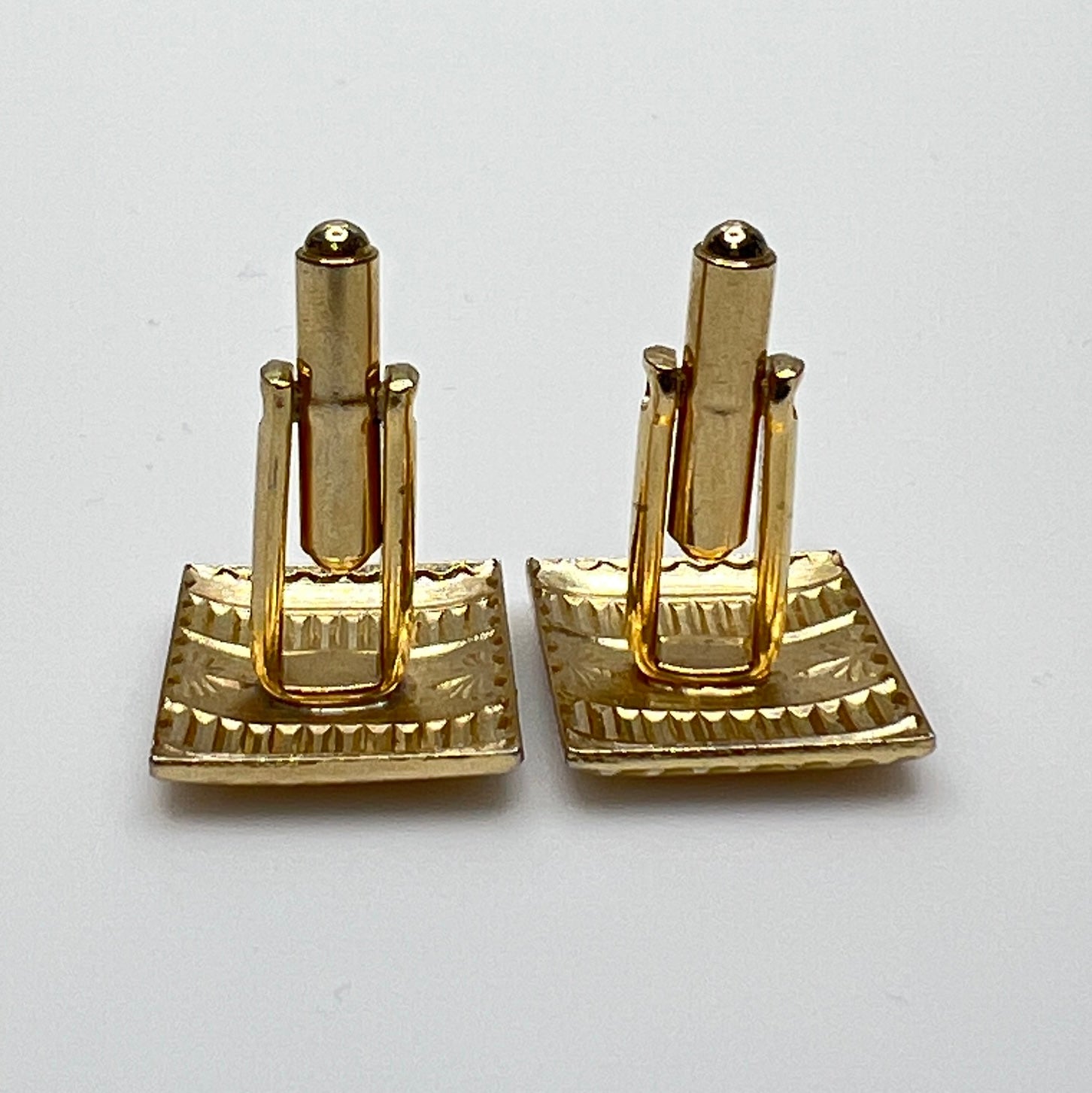 Rectangular Deco cufflinks with engraved detail and polished finish
