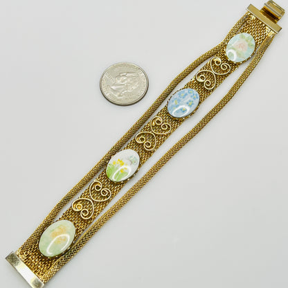 Vintage gold mesh bracelet with four floral cabochons