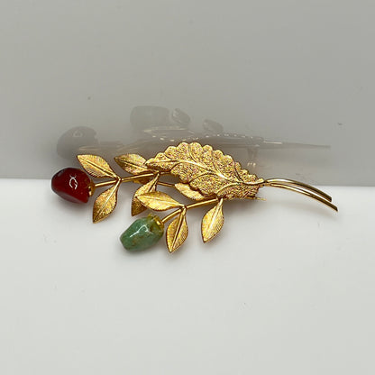 Vintage gold-tone brooch with red and green jade rose buds on long stem