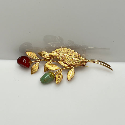 Vintage gold-tone brooch with red and green jade rose buds on long stem