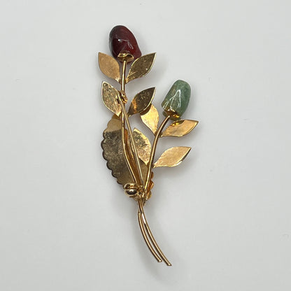 Vintage gold-tone brooch with red and green jade rose buds on long stem