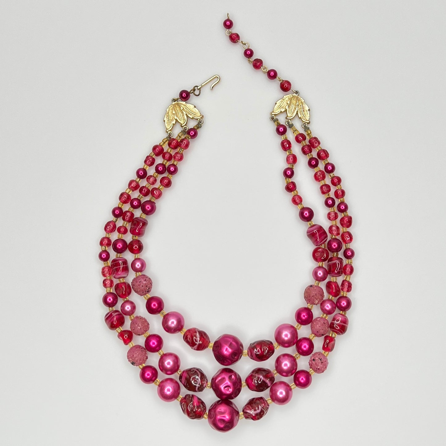 1950s Japanese necklace with bold pink beads and graduated layered design