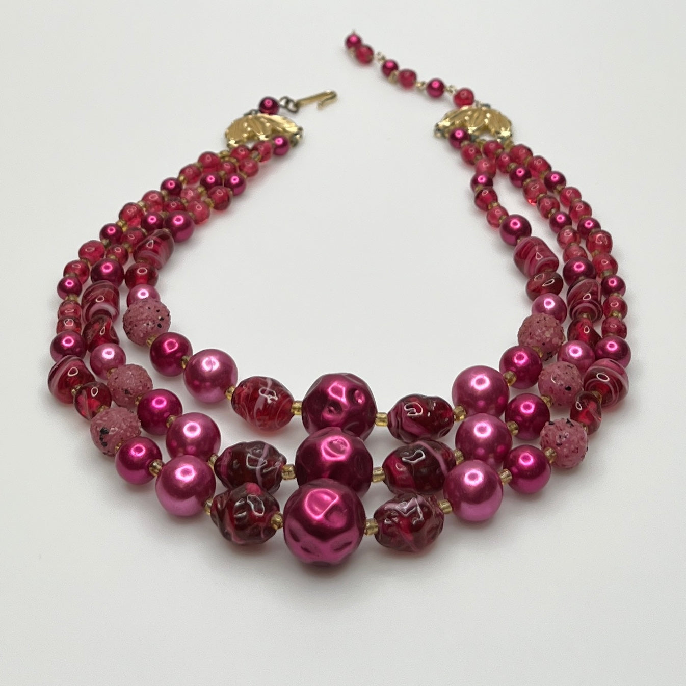 1950s Japanese necklace with bold pink beads and graduated layered design
