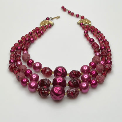 1950s Japanese necklace with bold pink beads and graduated layered design