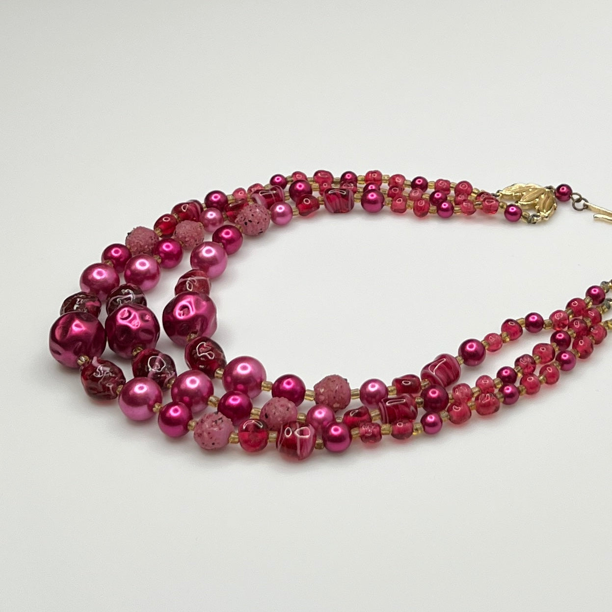 1950s Japanese necklace with bold pink beads and graduated layered design