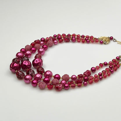 1950s Japanese necklace with bold pink beads and graduated layered design