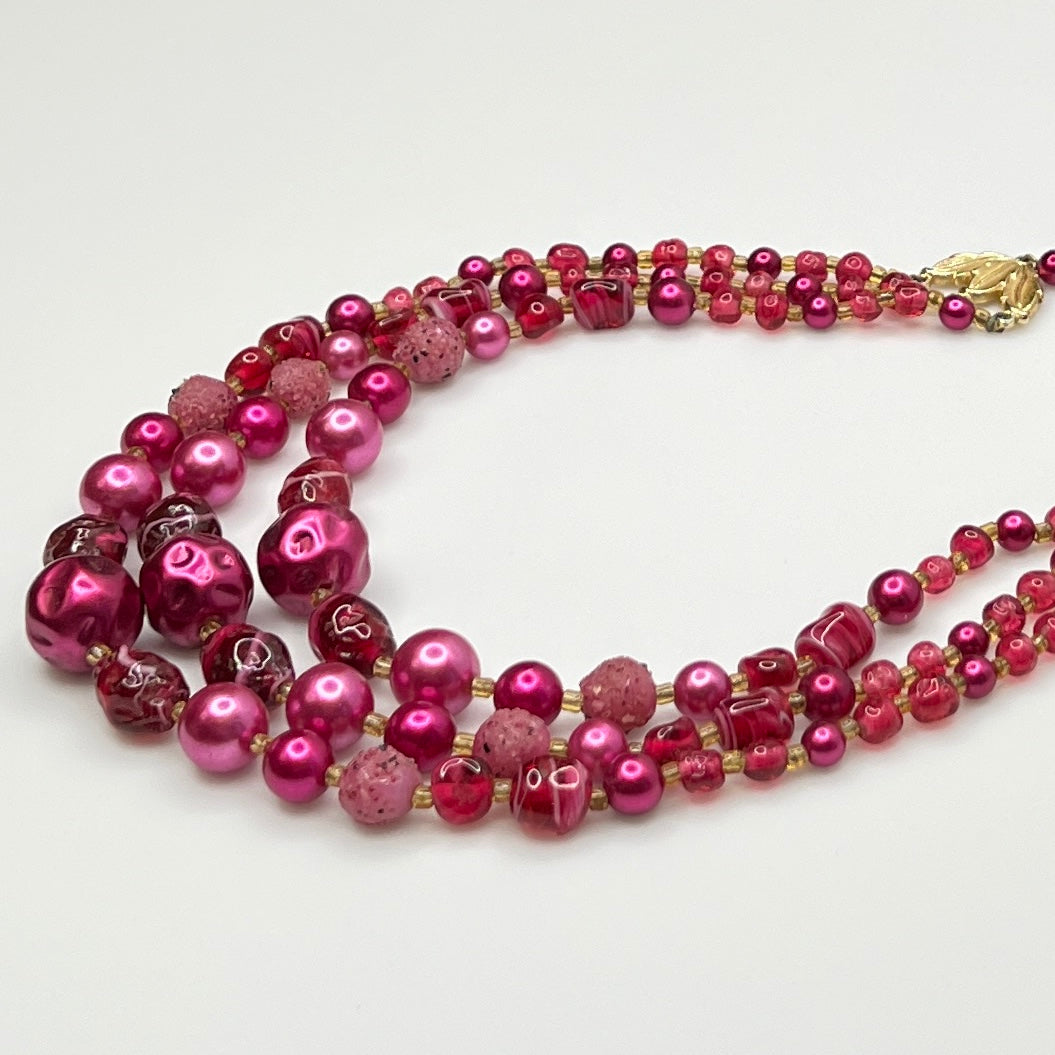 1950s Japanese necklace with bold pink beads and graduated layered design