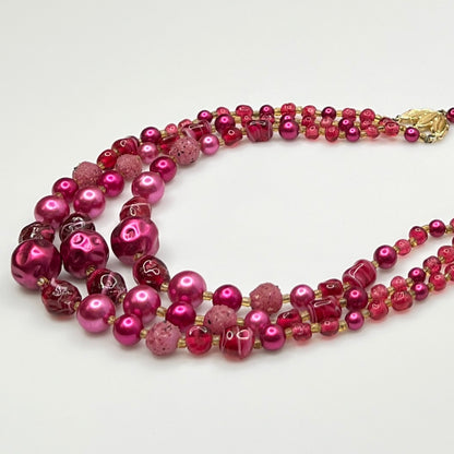 1950s Japanese necklace with bold pink beads and graduated layered design