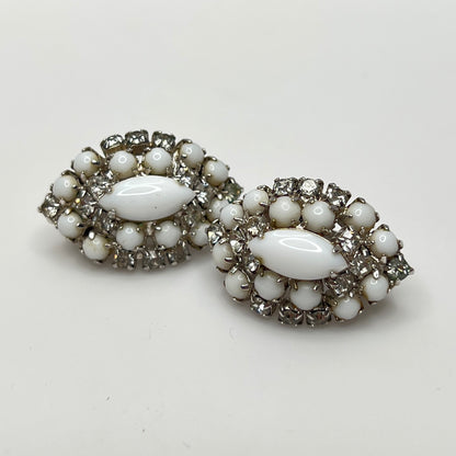 Mid-century milk glass and rhinestone clip-on earrings in marquise shape