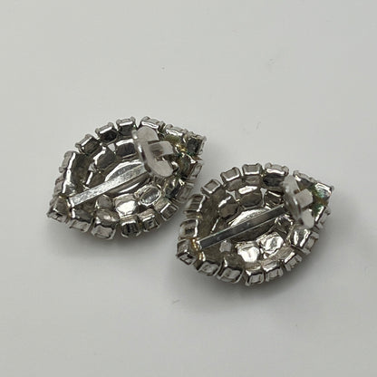1950s milk glass rhinestone earrings with sculptural silver-tone setting