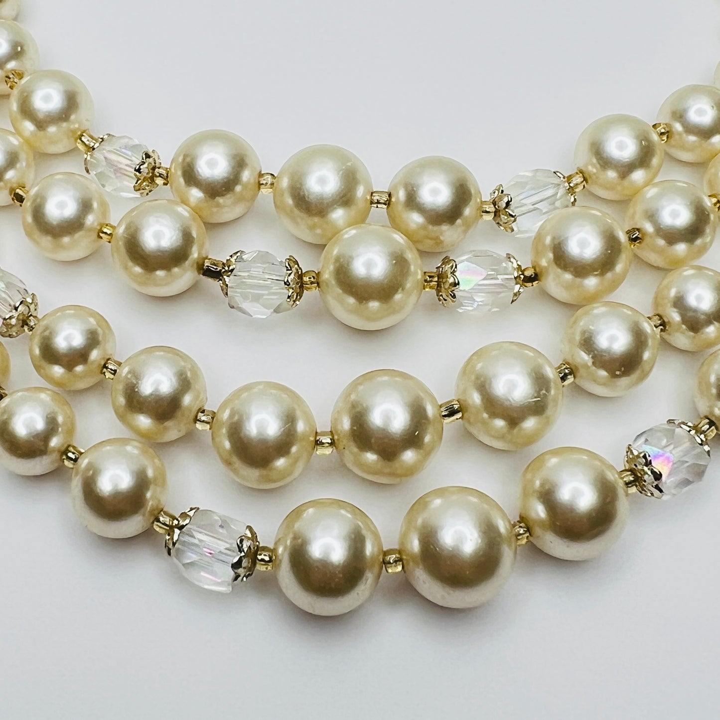Multi-strand faux pearl choker with aurora borealis crystal beads, 1950s vintage style