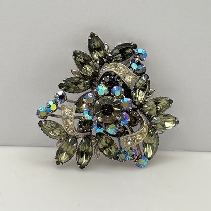 Close-up of aurora borealis floral cluster in vintage statement brooch