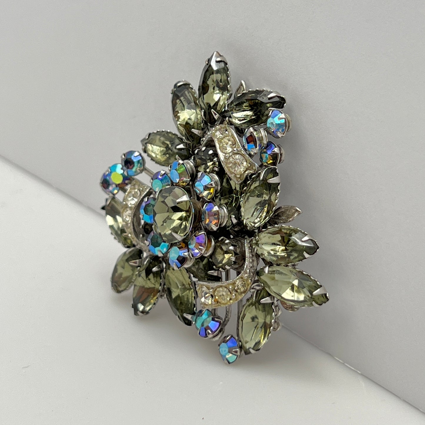 Vintage brooch with olive green navette rhinestones and aurora borealis crystals