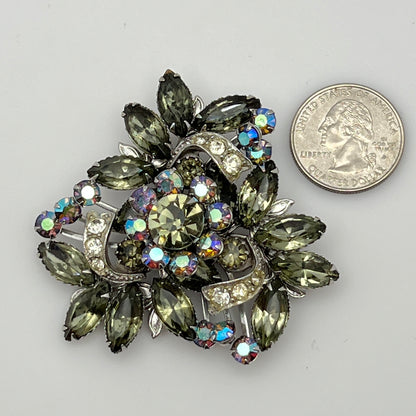 1950s silver-tone rhinestone brooch with leaf and ribbon motif