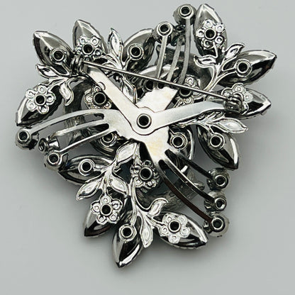 1950s silver-tone rhinestone brooch with leaf and ribbon motif