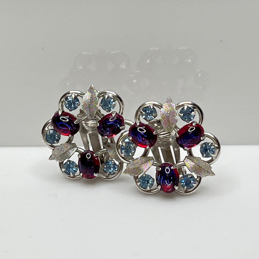 1950s floral earrings with prong-set stones and silver-tone leaf accents