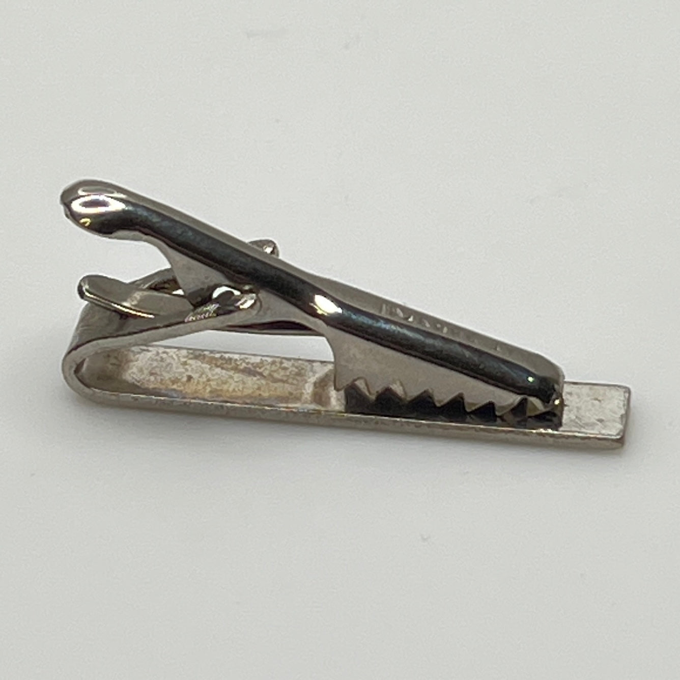 Vintage silver tie clip with crosshatch textured finish