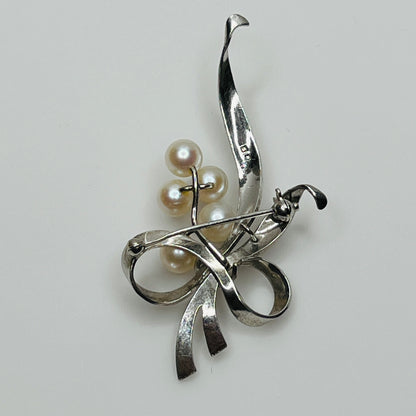 Reverse view of brooch signed Mikimoto