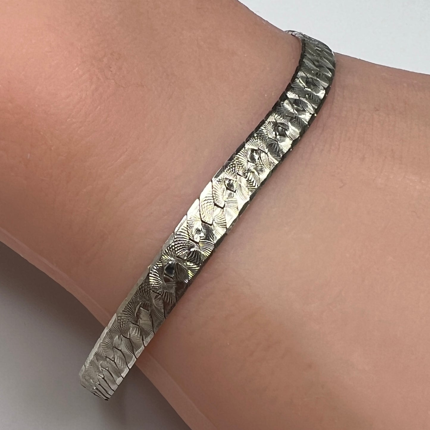 Vintage Milor sterling silver textured snake chain bracelet worn on wrist