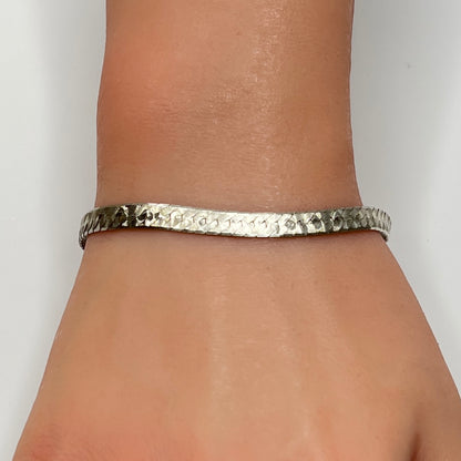 Vintage Milor sterling silver textured snake chain bracelet worn on wrist