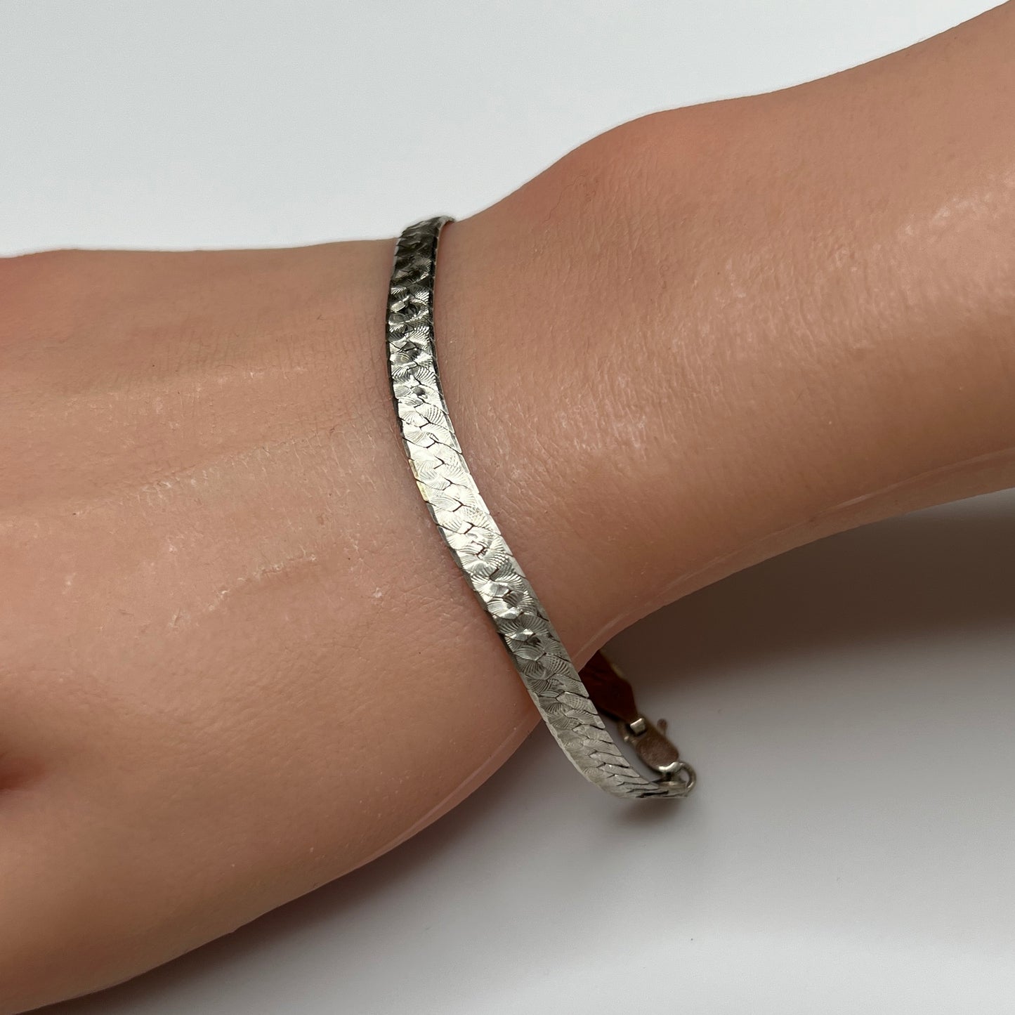 Vintage Milor sterling silver textured snake chain bracelet worn on wrist