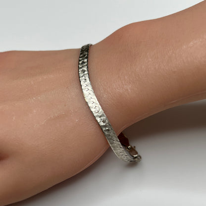 Vintage Milor sterling silver textured snake chain bracelet worn on wrist