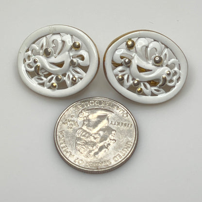 White enamel Monet jewelry set with bird of paradise motif clip-on earrings