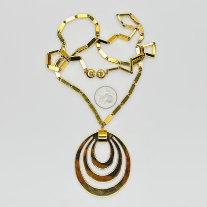 1980s Monet signed goldtone necklace with geometric pendant and rectangular chain
