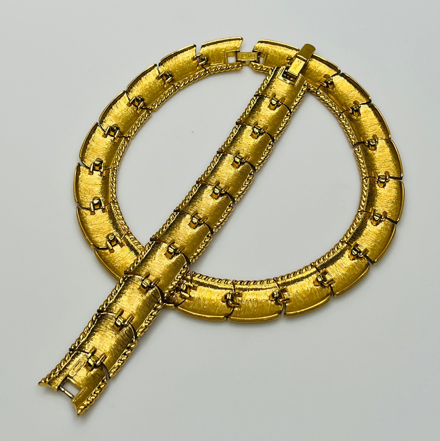 Signed Monet on reverse and clasp of both necklace and bracelet