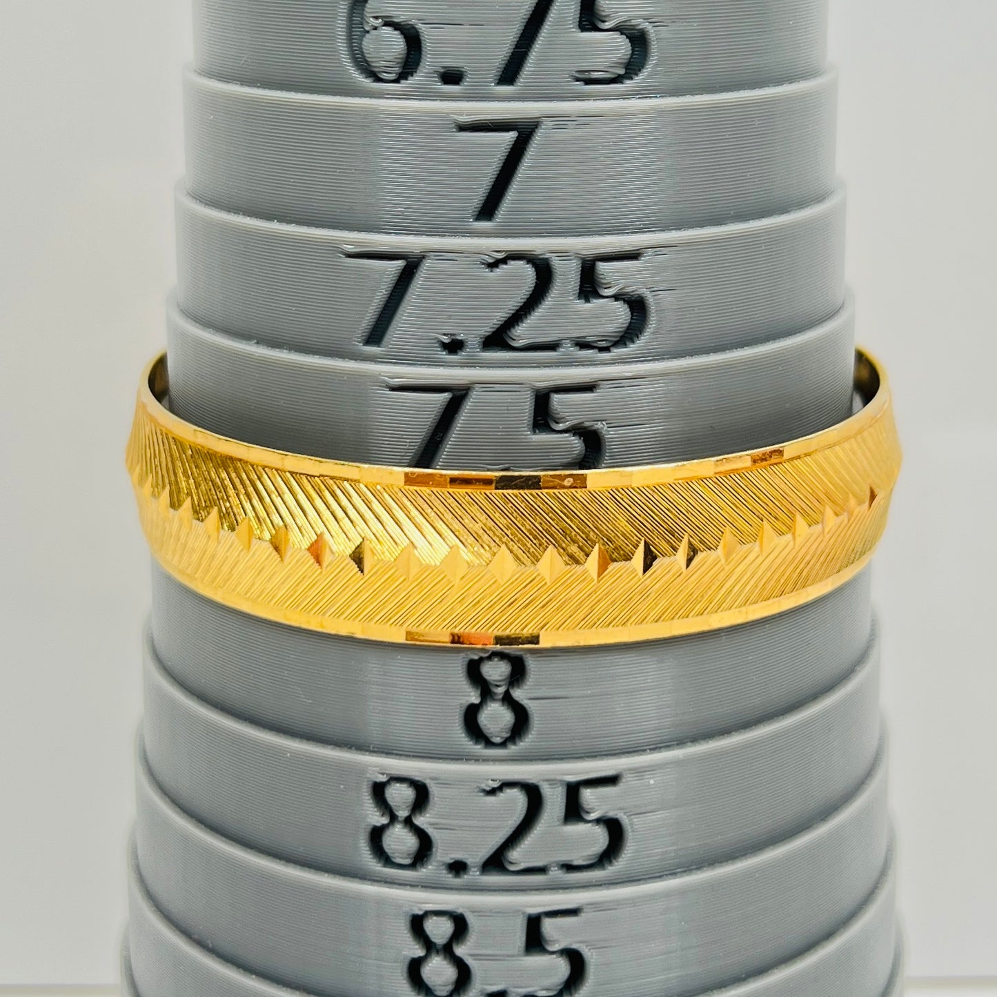 Signed Monet gold tone etched bangle bracelet