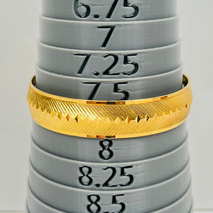 Signed Monet gold tone etched bangle bracelet